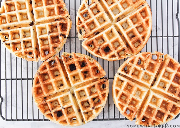 Belgian chocolate chip waffles on a cooling rack