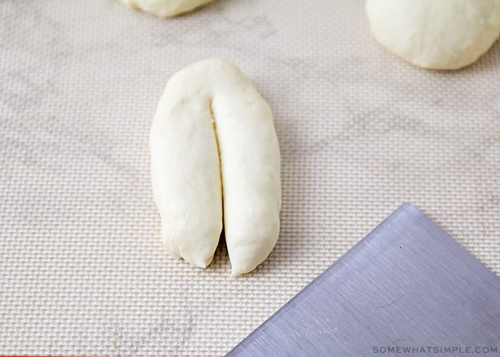 rolled out dough that has been cut down the middle
