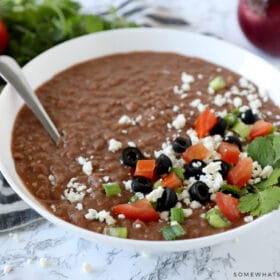 homemade refried beans in a white bowl